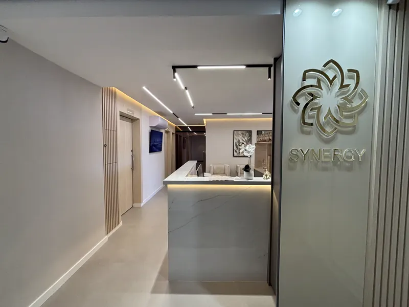 Recepção da SYNERGY com o logotipo dourado